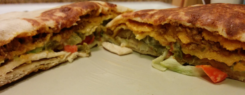 Illustration for article titled SnackTAYku: Taco Bell's Triple Double Crunchwrap Is 2 or 3 Times As Good As the Regular Kind
